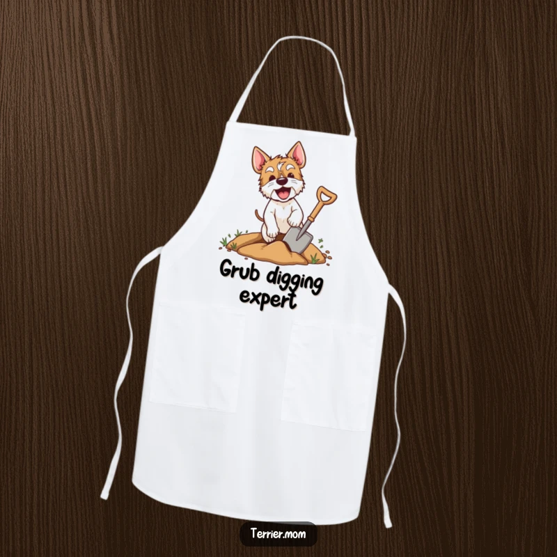 Funny terrier apron featuring an excited dog digging with a shovel, a humorous and practical kitchen accessory for dedicated cooks.