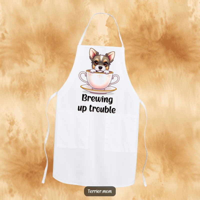 Funny terrier with bright eyes peeking from a miniature teacup, on a practical kitchen apron.