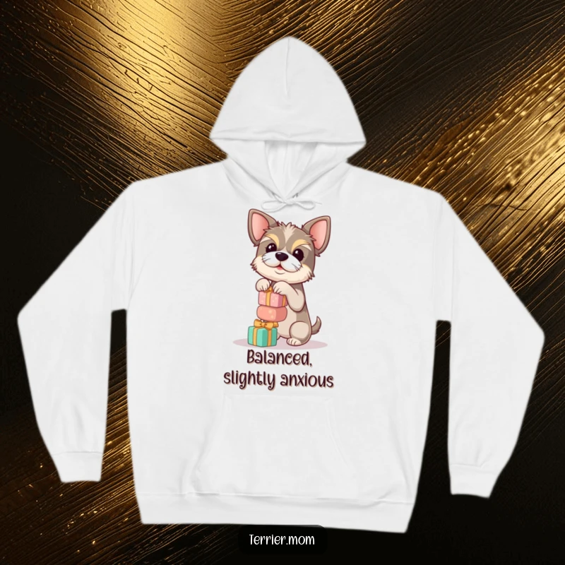 Funny terrier hoodie depicting a dog balancing a tall stack of small gifts, perfect for cozying up with a laugh.