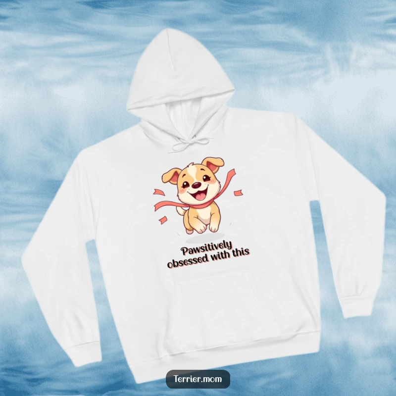 Funny Dog Hoodie featuring a joyful, energetic dog joyfully leaping to catch a fluttering ribbon, perfect for cozy, humorous wear.