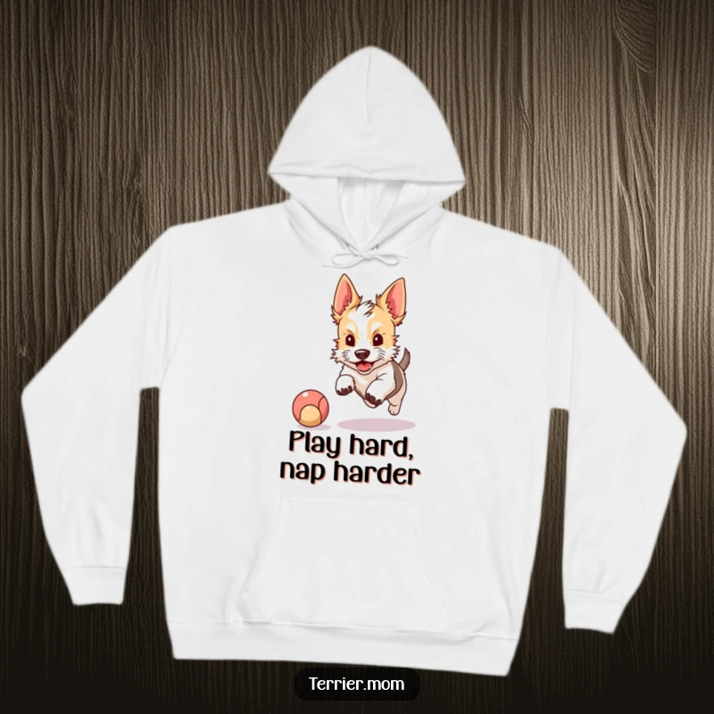 Funny hoodie depicting a kawaii terrier with perky ears, eyes locked on a bouncing ball, captured mid-chase with enthusiastic energy.