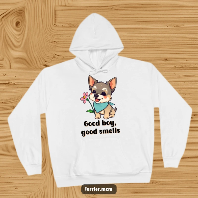 Funny terrier in a bandana, sniffing a blooming flower with pure joy, featured on a cozy hoodie.