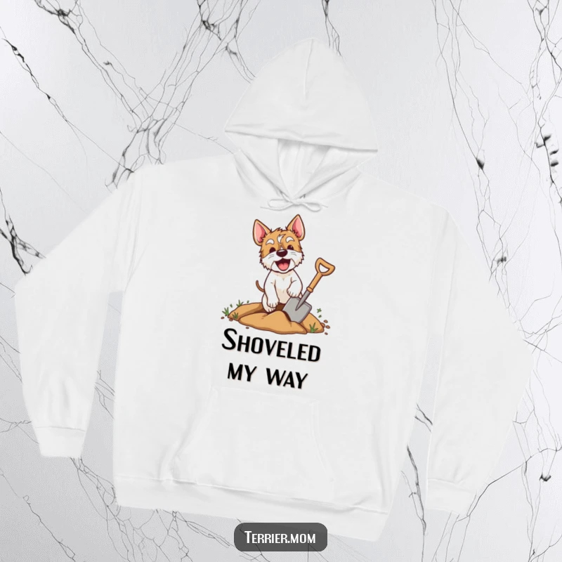 Funny terrier hoodie showing an excited dog digging with a shovel, perfect for staying warm and celebrating a dog's passion.