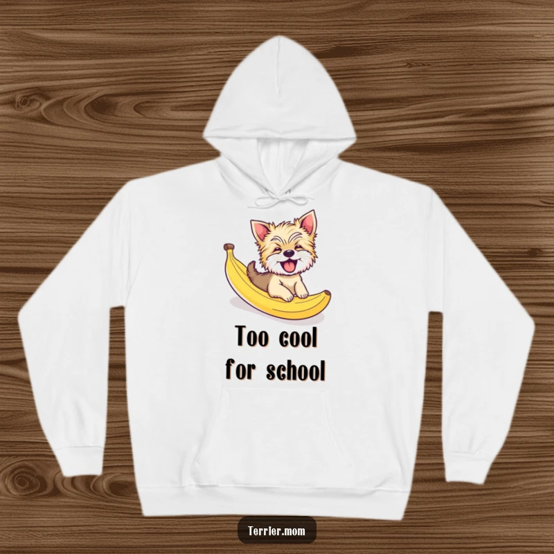 Funny Terrier dog hoodie, giggling and joyfully sliding down a banana peel, a cozy and comical piece of apparel.