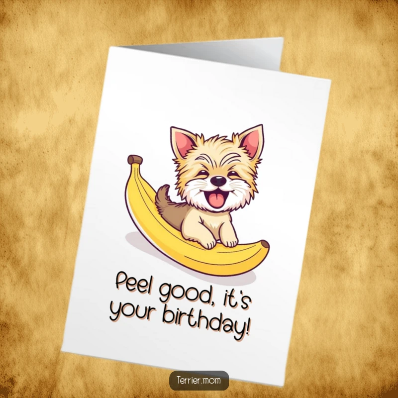 Funny Free Printable Birthday Card: A giggling Terrier dog joyfully slides down a bright yellow banana peel, pure comedic delight.