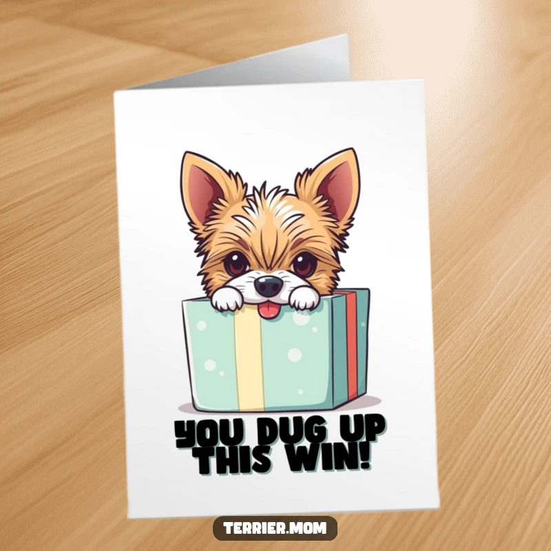 Free printable congratulations card: A curious Terrier dog peeks mischievously from a brightly wrapped gift box, ready to celebrate.