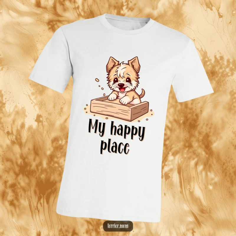 Funny T-Shirt featuring a terrier joyfully digging in a sandbox, dirt flying happily, capturing a moment of pure canine bliss.